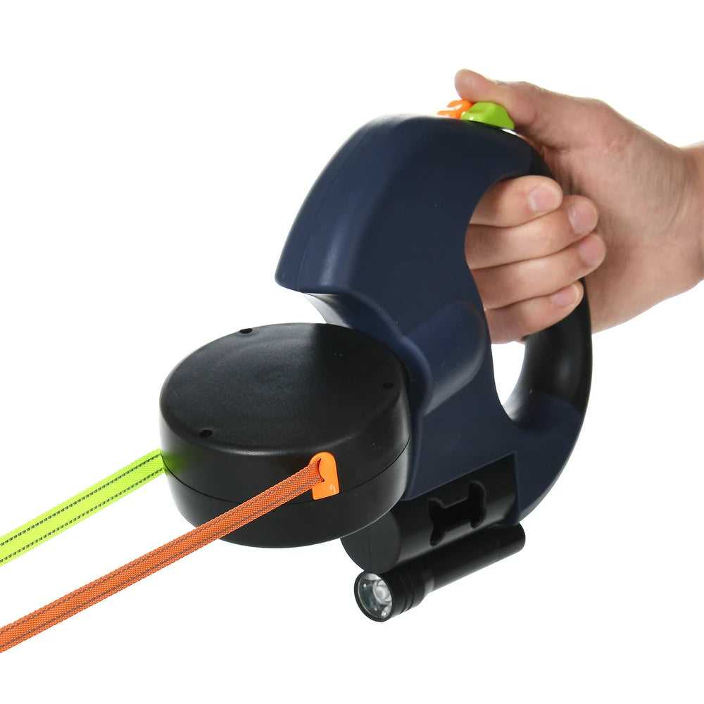 LED flashlight on dual dog leash handle for night walks